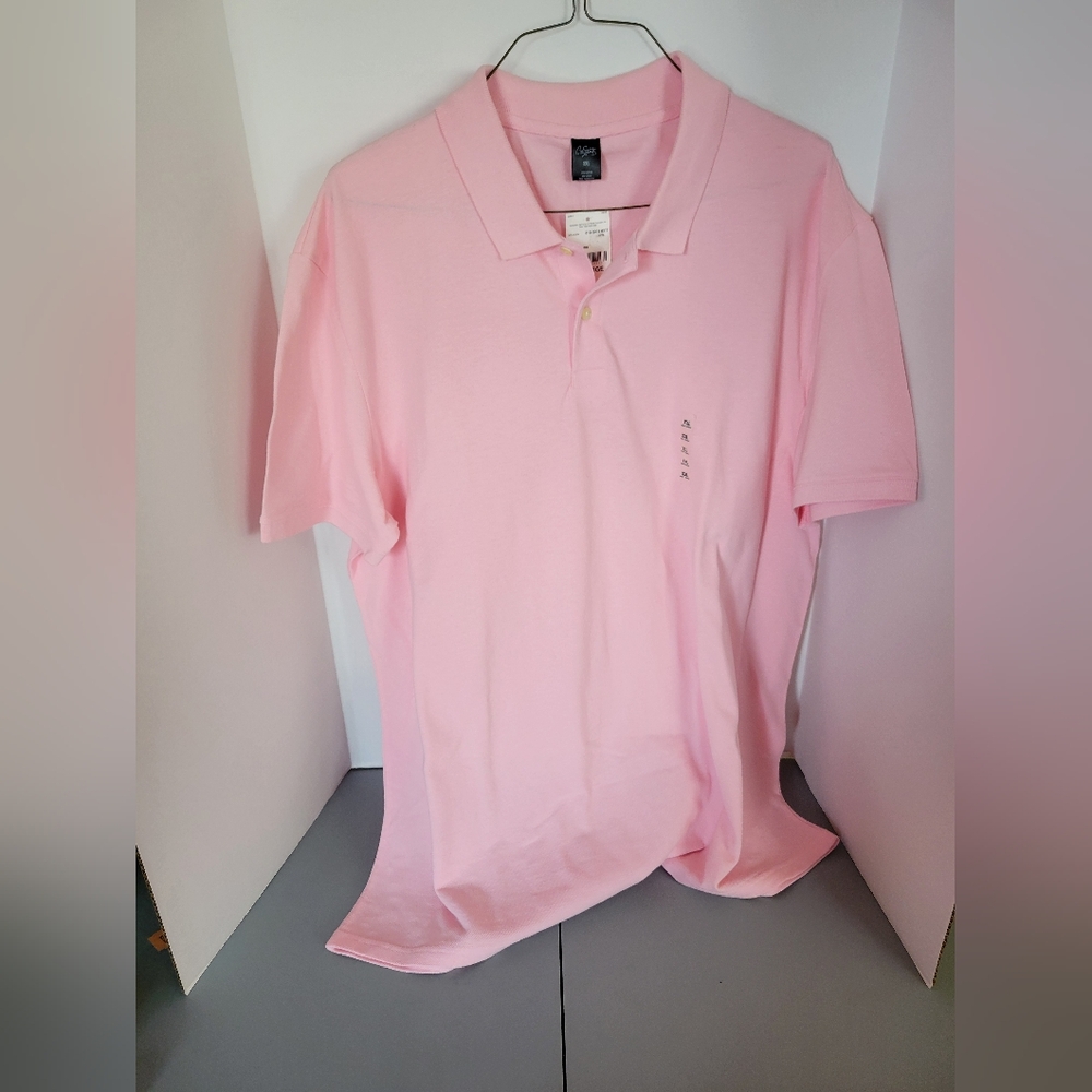 Never word pink polo mens 2xl has spot at the bottom